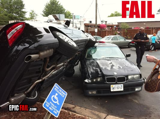 Car accident even knocks over the handicap sign while at it — fail moment