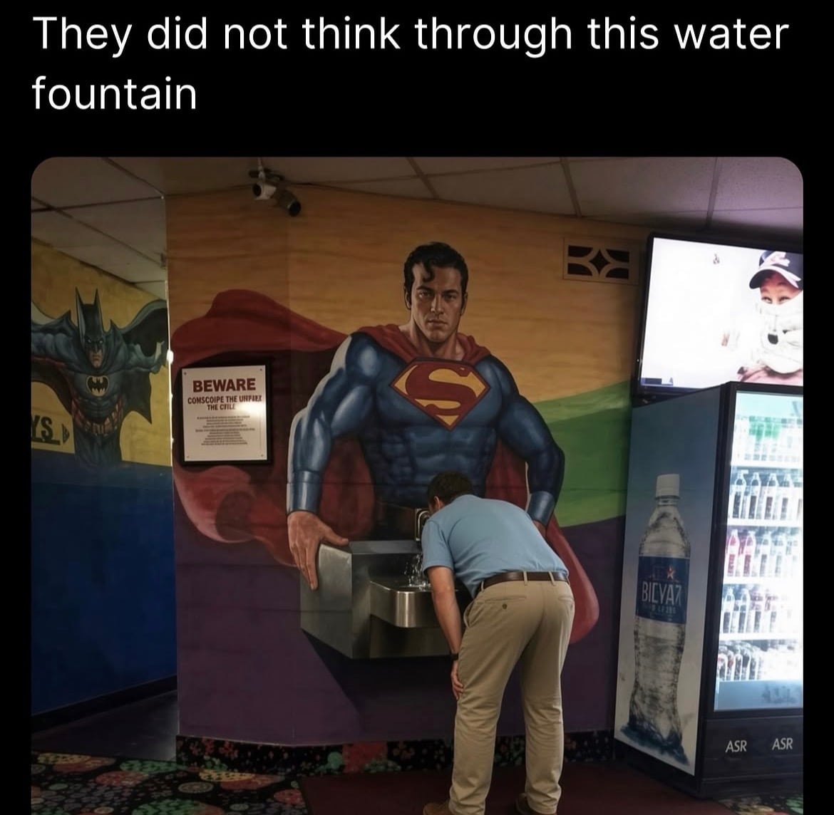 The Worst Designed Superman Water Fountain Ever — fail moment
